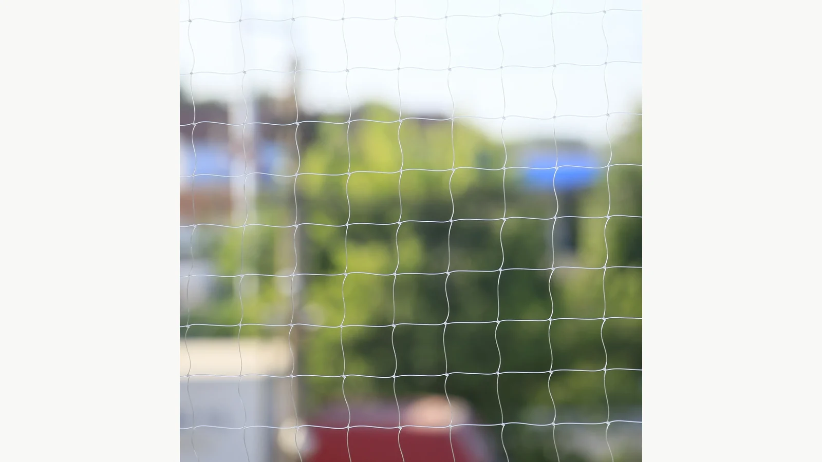 Transparent nylon net showing the mesh structure that must remain captured around an approved rigid frame
